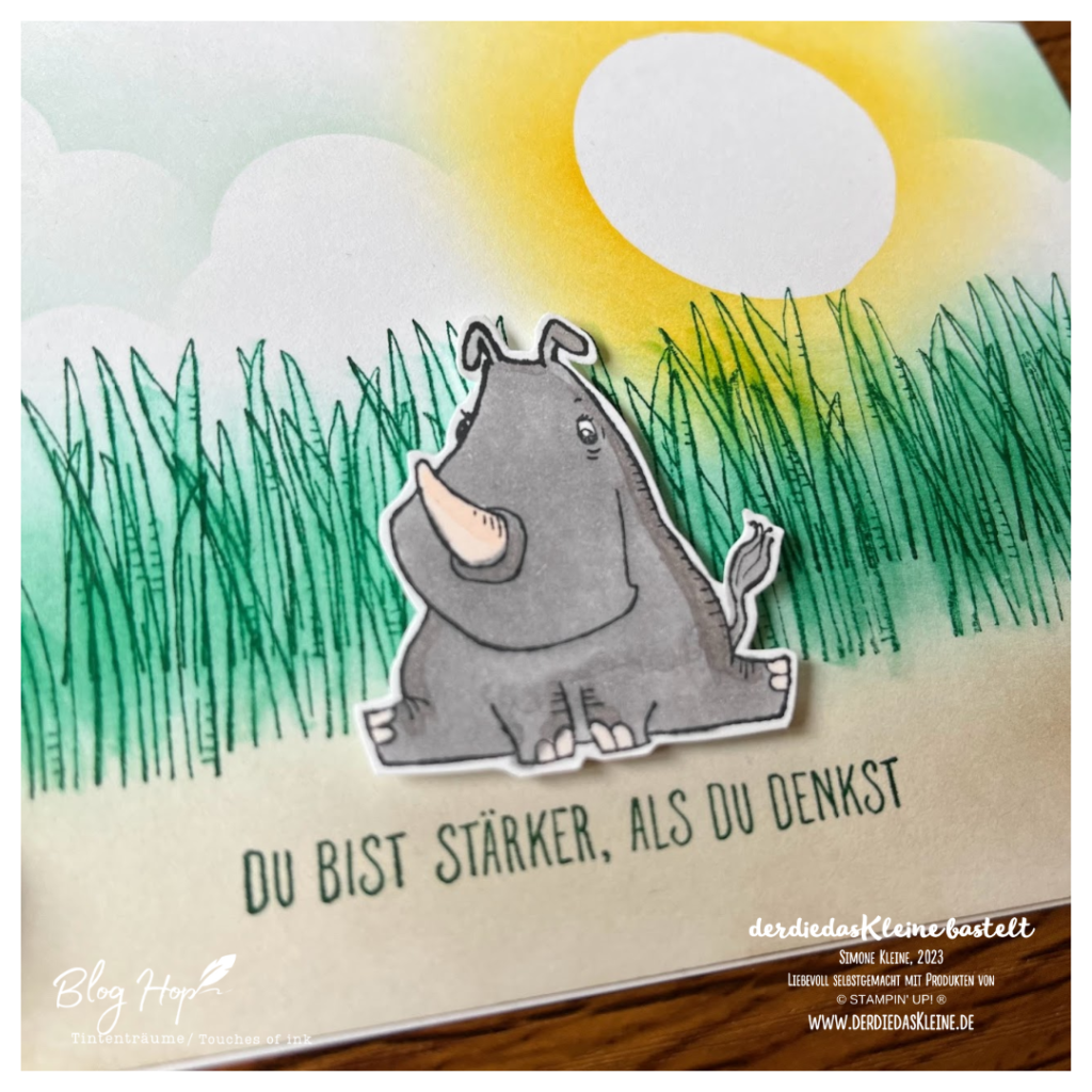 Du bist stärker, als du denkst.
Karte in Detailansicht, mit Nashorn vor grünem Gras und Wolkenhimmel mit greller Sonne.