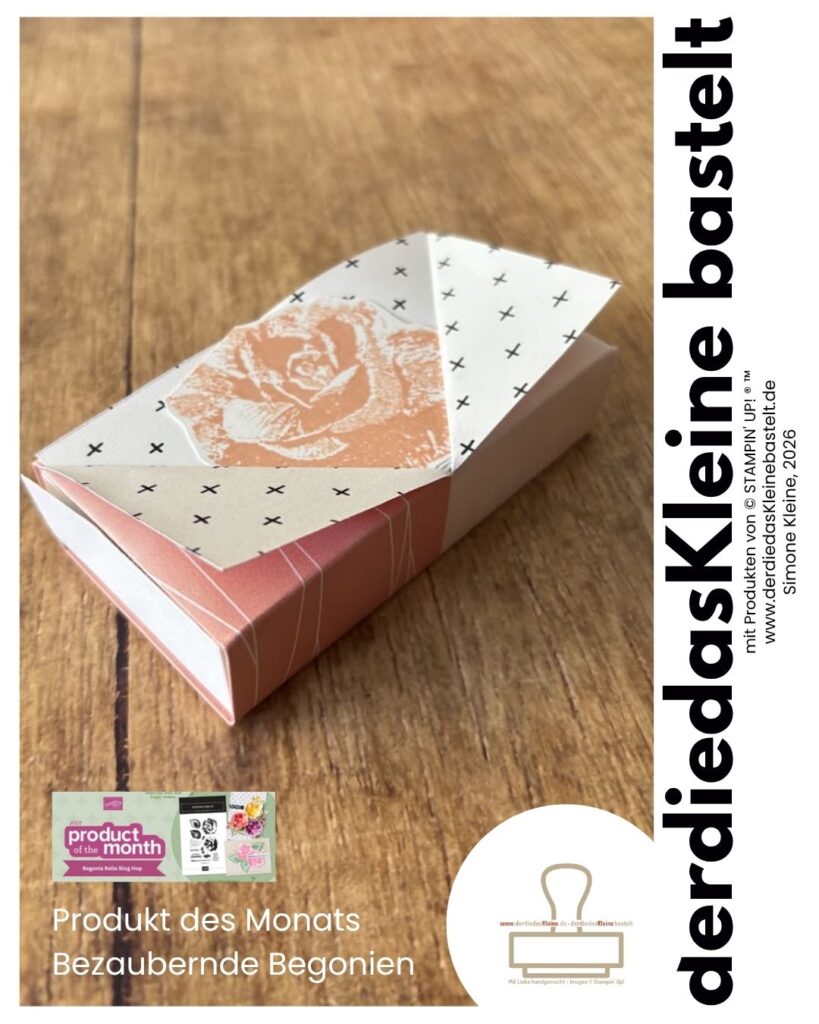 Schachtel mit einer Begonie in der Mitte